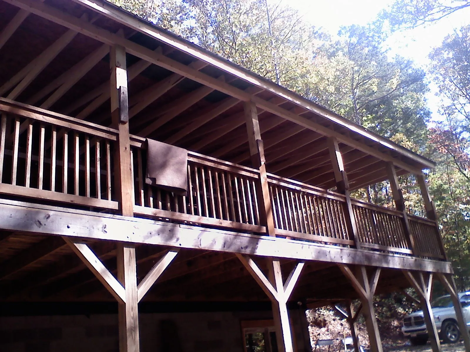 Timber framing under a new elevated porch and deck — Roof Leak Repair in Dodge by Roofing Brothers